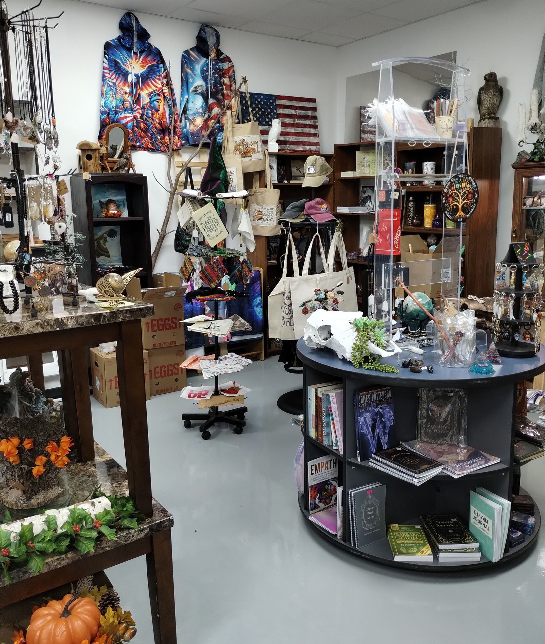 A retail shop interior filled with merchandise on display shelves and racks.