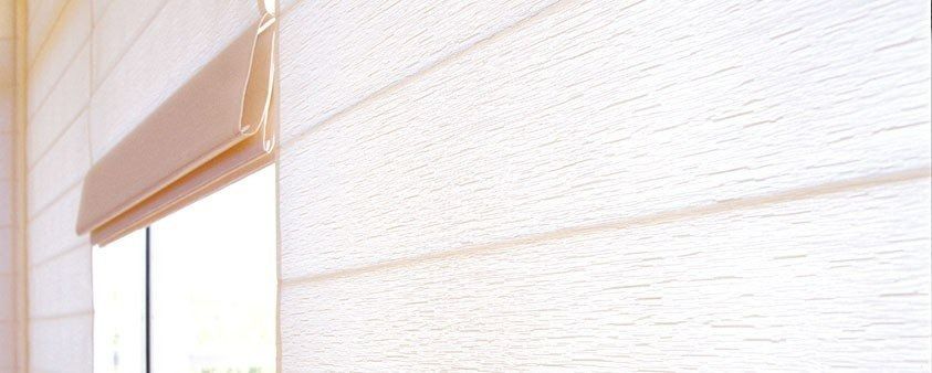 A Close Up of a Window With White Blinds on It — Simply Smarter Blinds in Nelson Bay, NSW