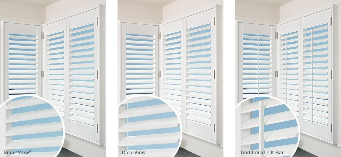 A Row of White Shutters With Blue Stripes on Them — Simply Smarter Blinds in Nelson Bay, NSW