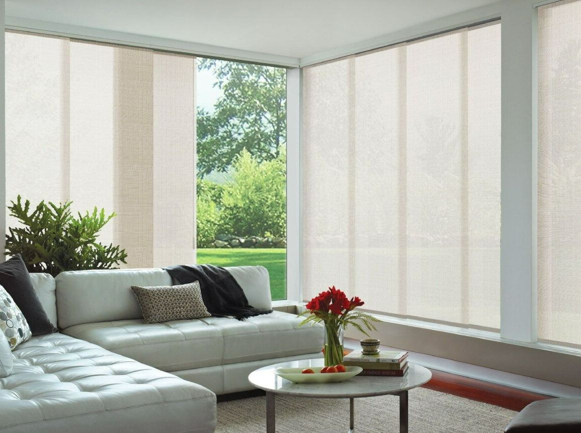 A Living Room With a Couch and a Coffee Table — Simply Smarter Blinds in Tea Gardens, NSW