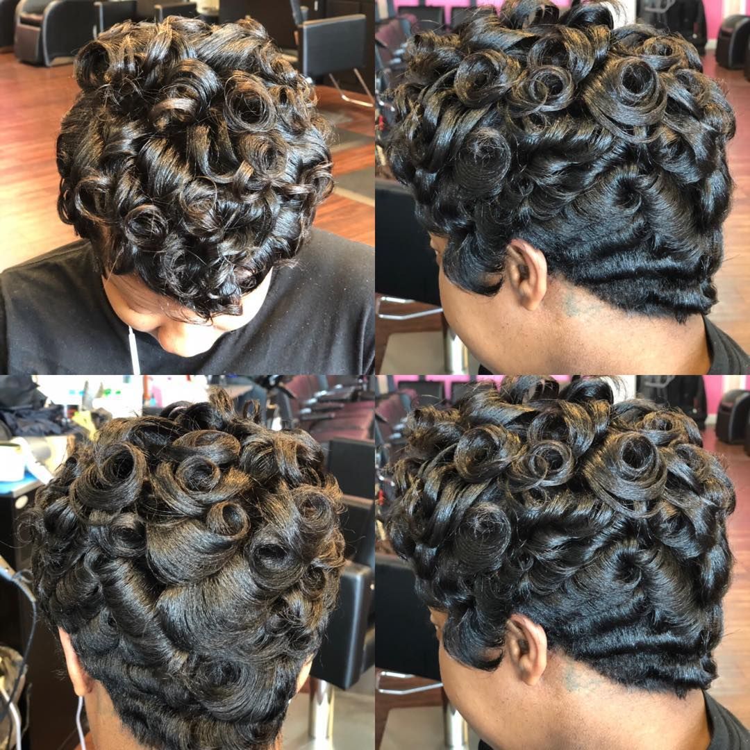 Close-up collage of a short, curly black hairstyle from multiple angles in a salon.