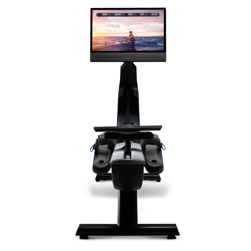Black rowing machine with screen, seat, and footrests on a white background