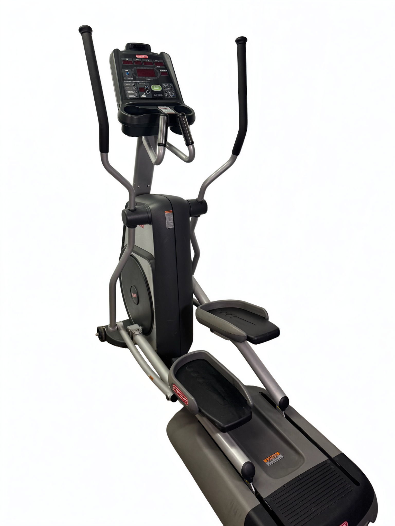 Elliptical exercise machine with handlebars, foot pedals, and display console on a white background