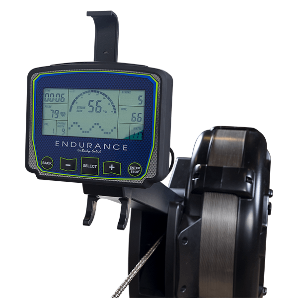 Digital rowing machine display showing workout metrics with a flywheel on the right