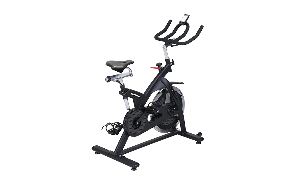 Black stationary exercise bike with handlebars and seat on a metal base.
