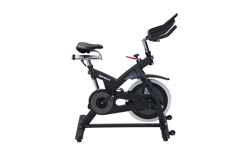 Black stationary exercise bike with handlebars and seat on a metal base.