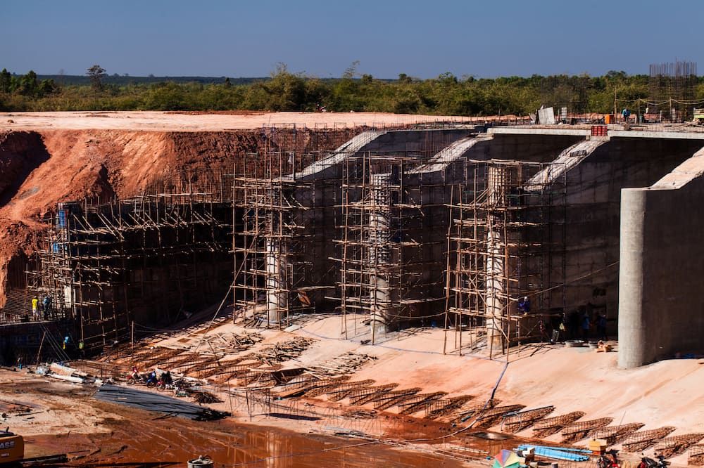 A Construction Site with a Lot of Scaffolding on It — Simon Dickson Excavations in Bundanoon, NSW