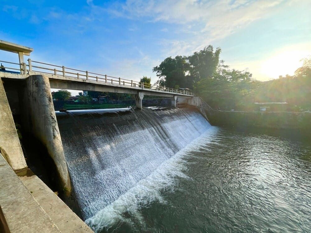 A Bridge Over a River with a Waterfall — Simon Dickson Excavations in Goulburn, NSW