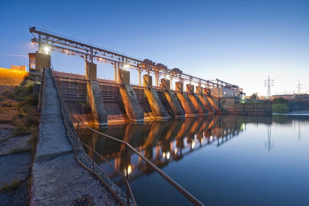 A Dam is Lit Up at Night and Reflected in the Water — Simon Dickson Excavations in Moss Vale, NSW