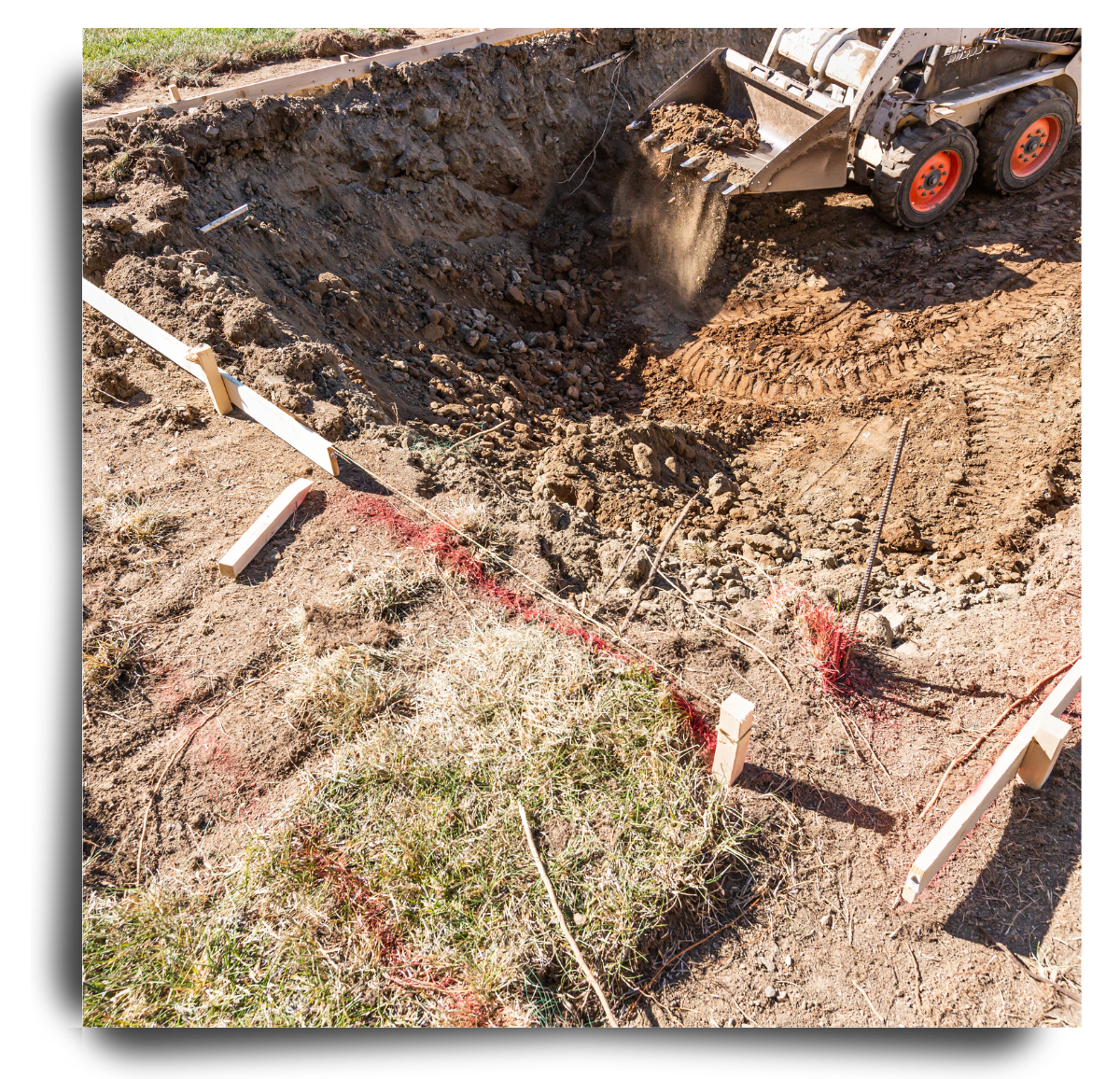 Landscape installation with bulldozer digging in the ground