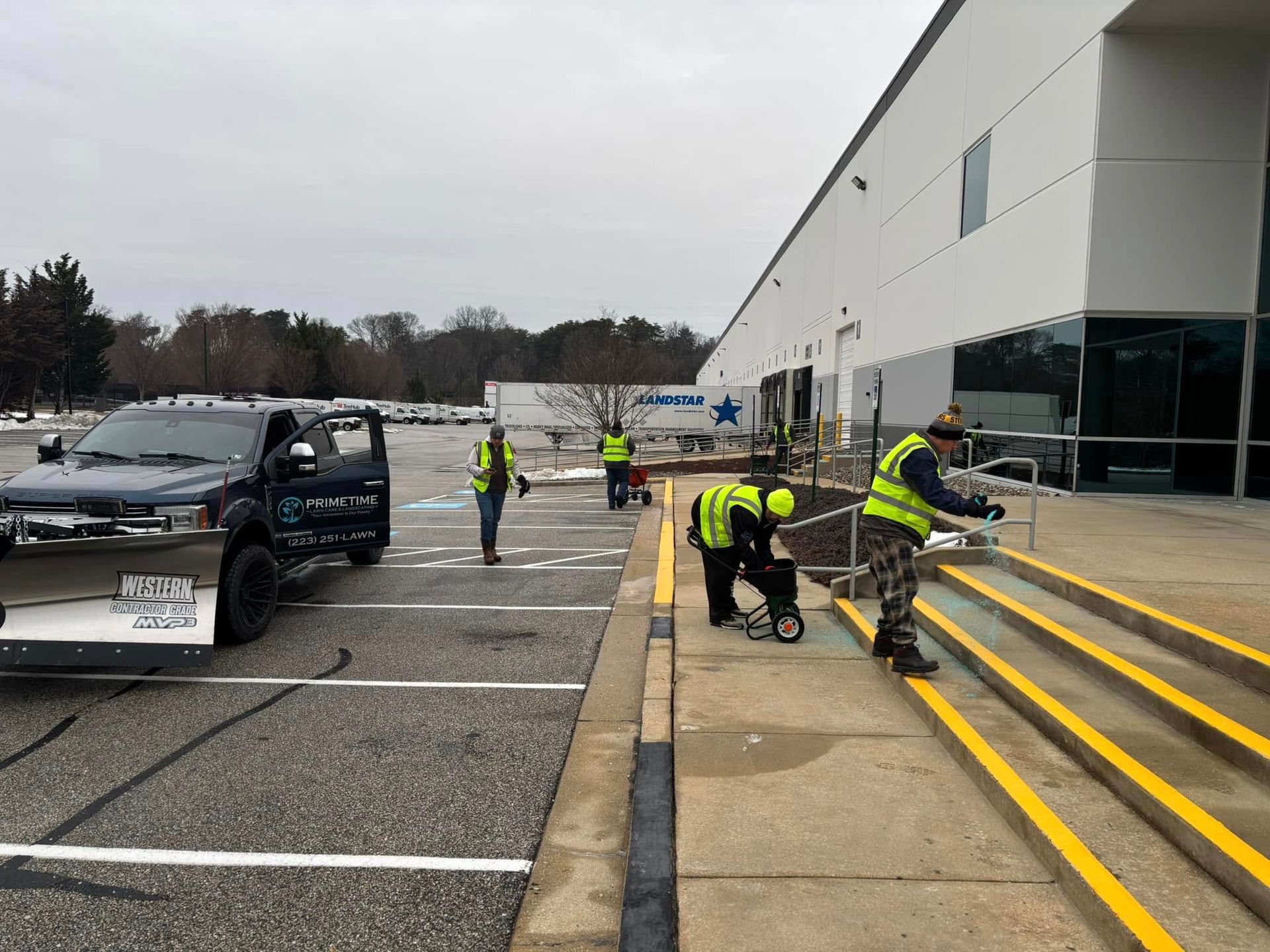 PRIMETIME lawn care and landscaping staff snow prepping