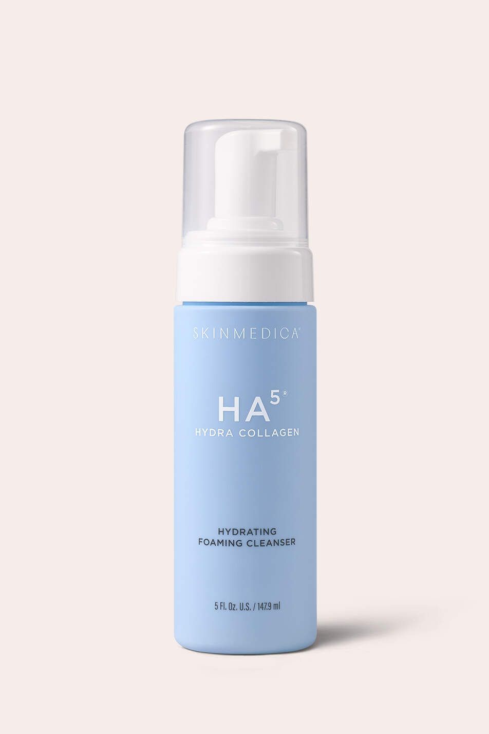 Blue H5 skincare bottle with white pump on a pale pink background