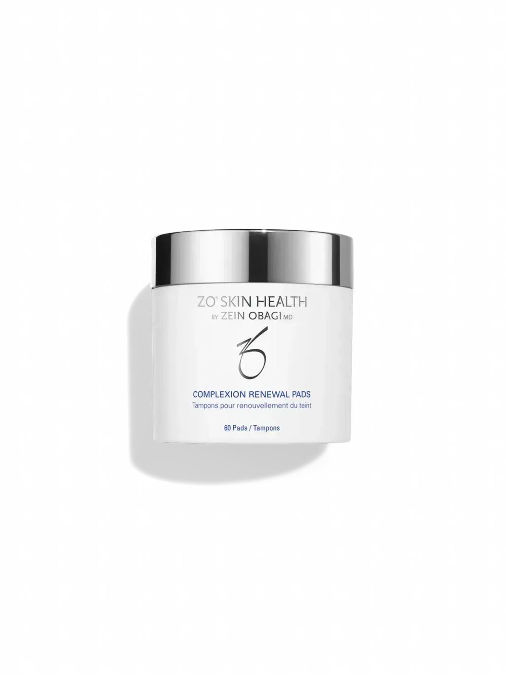 White skincare cream jar with silver lid on a plain white background