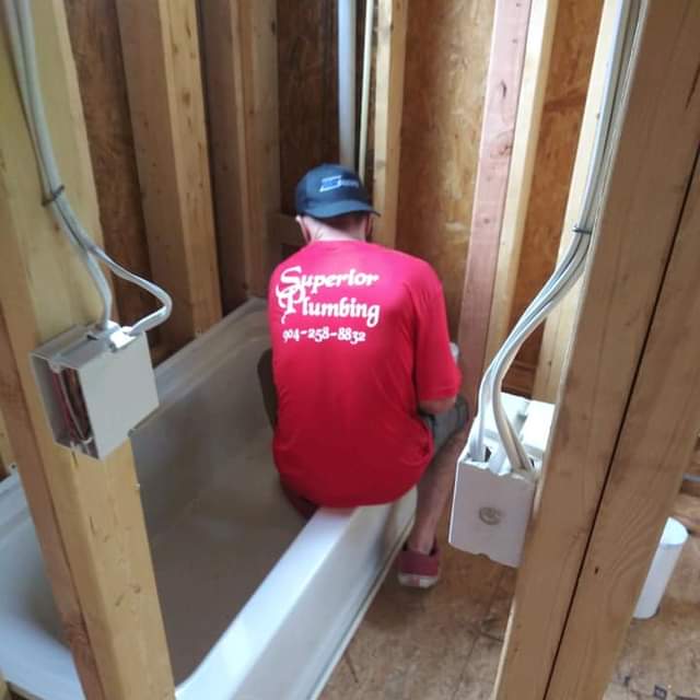 man fixing home pipes