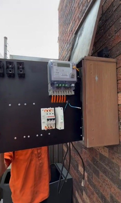 Electrical Meter and Control Boxes Mounted on A Brick Wall — SRB Electrical Contracting Pty Ltd In Davistown, NSW