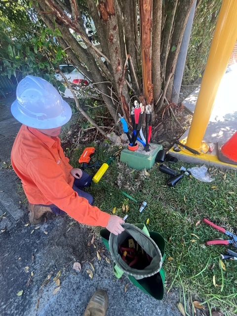 Open Electrical Box in a Dirt Trench — SRB Electrical Contracting Pty Ltd In Davistown, NSW