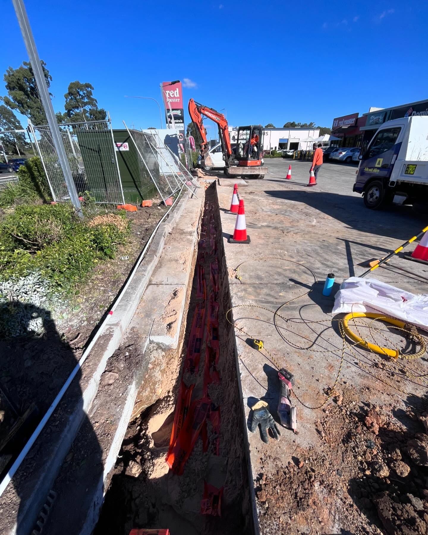 Road Excavation with Deep Trench and Traffic Cones — SRB Electrical Contracting Pty Ltd In Davistown, NSW