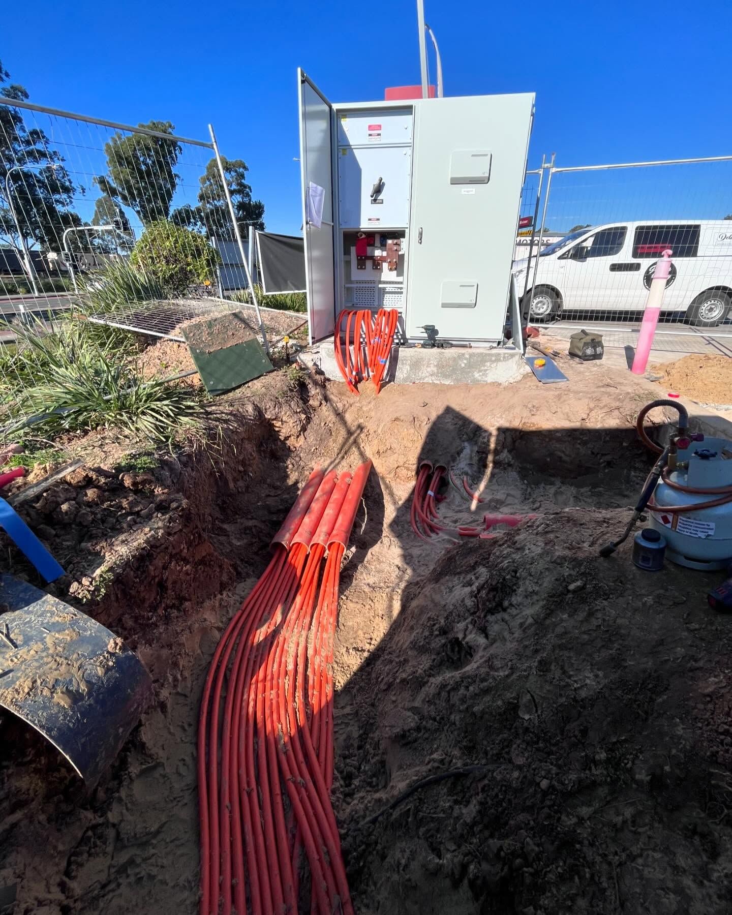Construction Site with Red Cables in A Dirt Trench — SRB Electrical Contracting Pty Ltd In Davistown, NSW