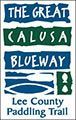 The Great Calusa Blueway logo: blue and green text, paddles, and fish symbol; Lee County Paddling Trail.