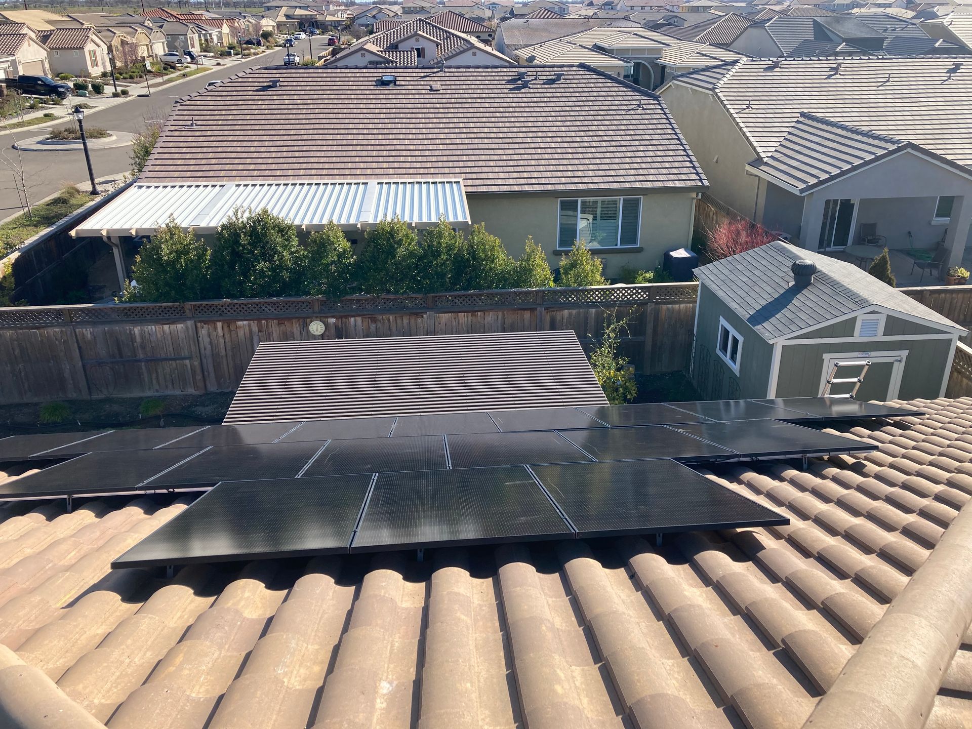 A roof with a lot of solar panels on it