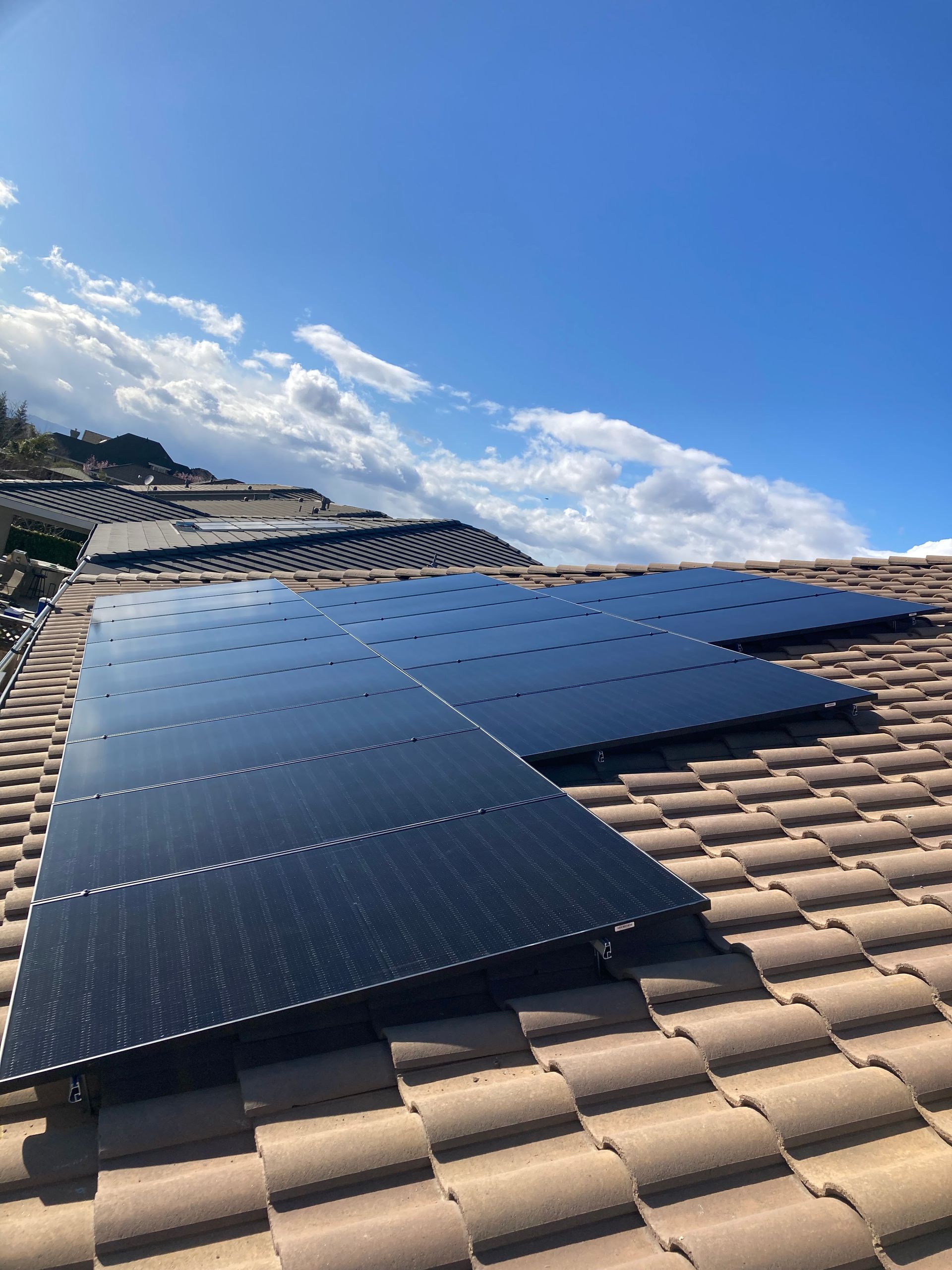 A roof with a lot of solar panels on it