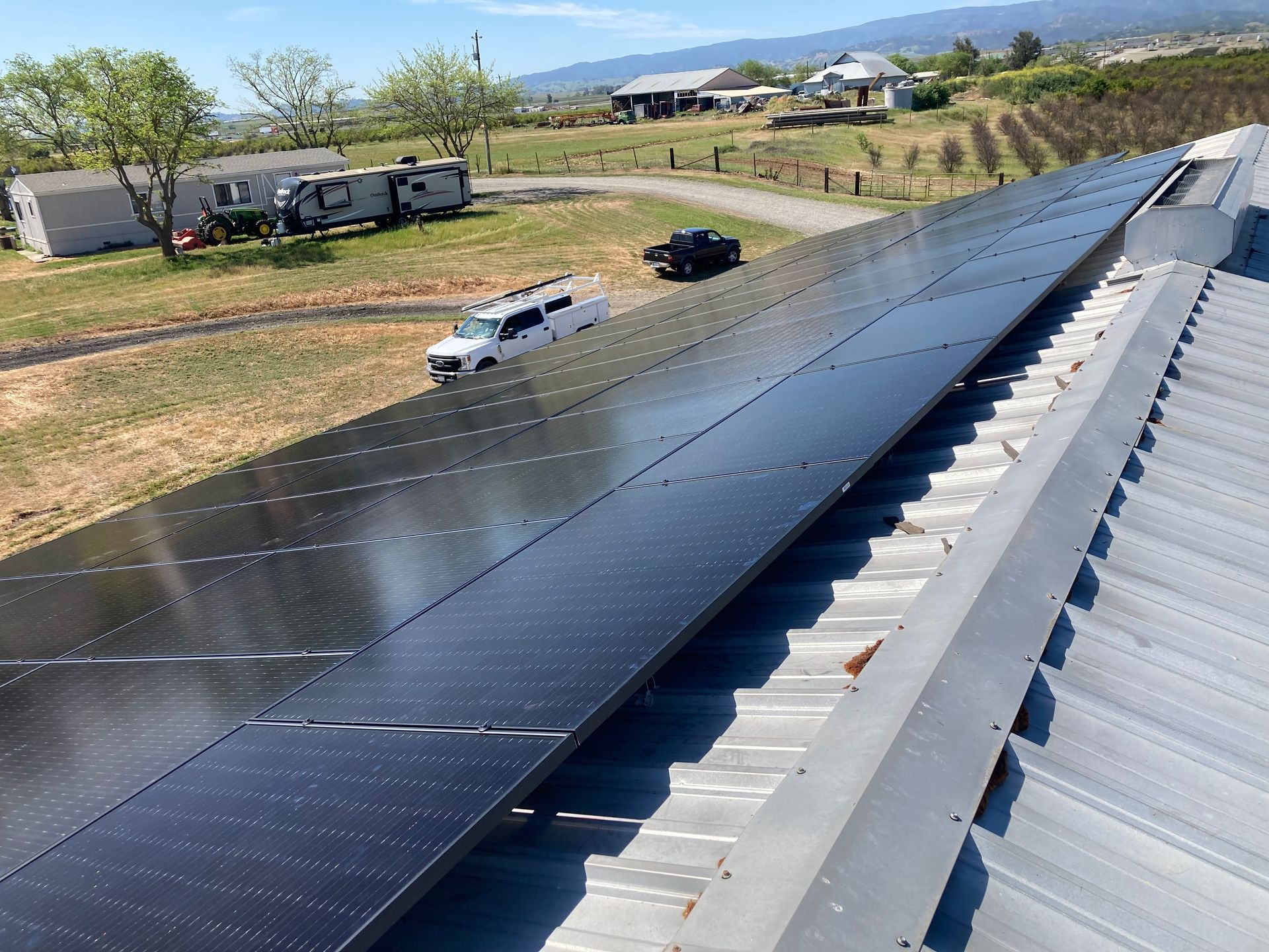 A roof with a lot of solar panels on it