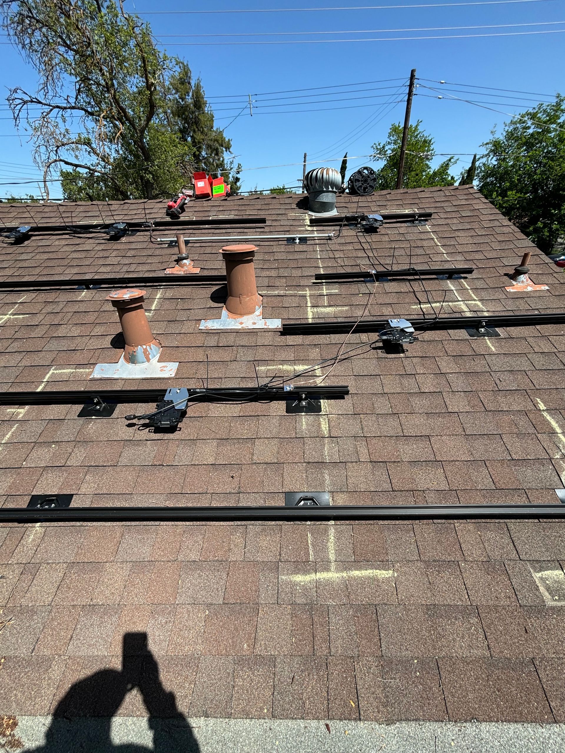 A roof with a lot of solar panels on it