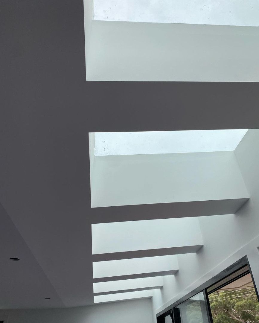 Looking Up At The Ceiling Of A Building With A Lot Of Windows — MC Plastering In Maitland, NSW