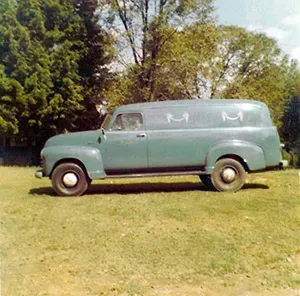 Old, green van Mynatt Funeral Home, Inc.