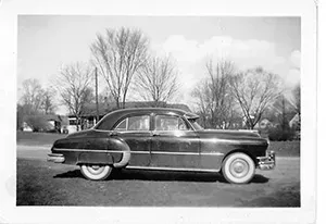 Black and white photo of hearse Mynatt Funeral Home