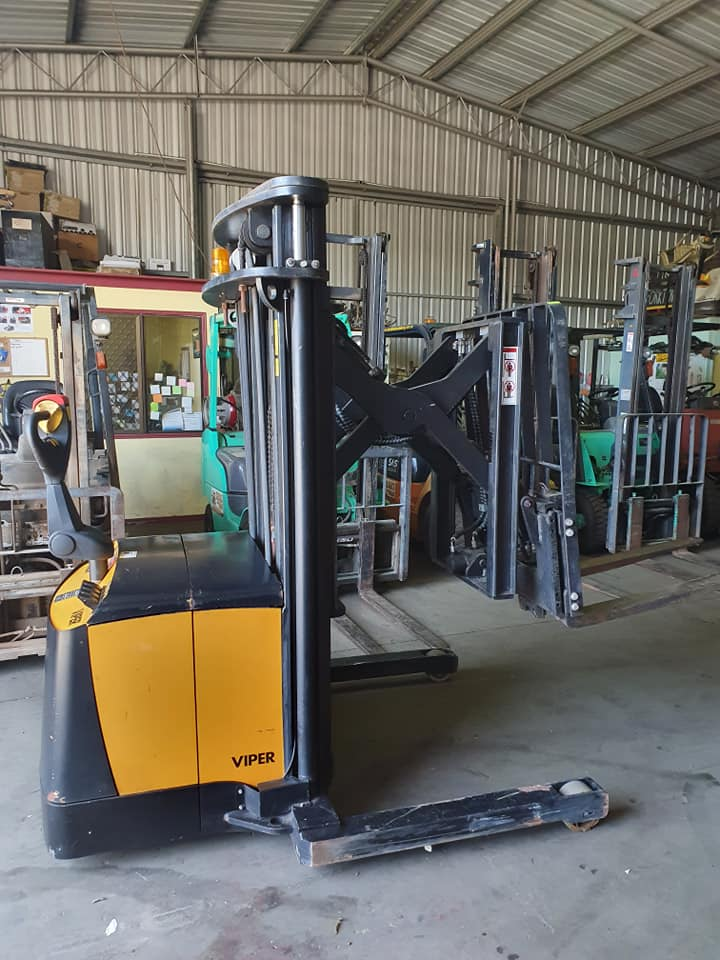 Forklift With Mast Raised Inside a Warehouse — Forklift Repairs & Spares In Svensson Heights, QLD