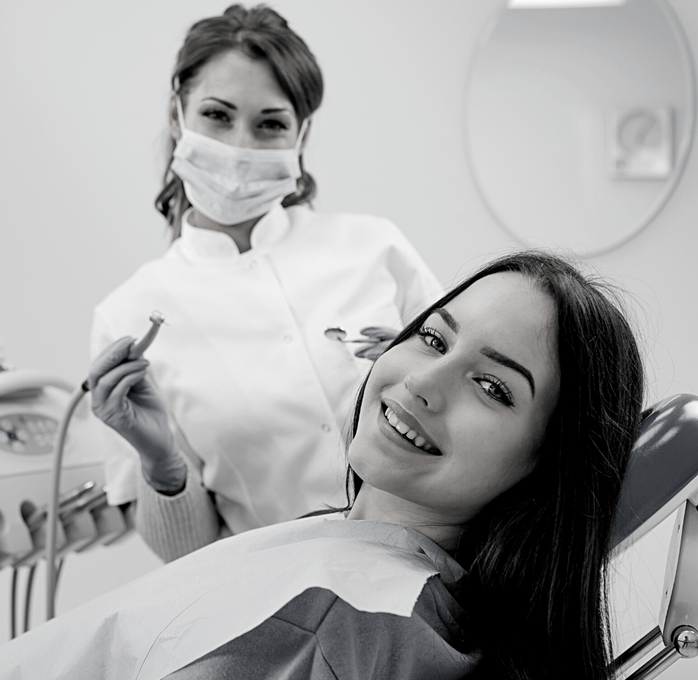 Woman showing healthy teeth | Get dental fillings in Leawood 66209. Dental fillings