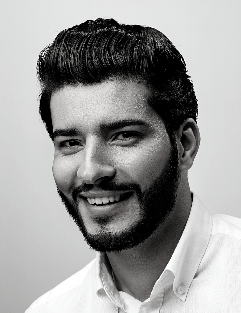 Man with a perfect smile | Visit the best dentist in Leawood 66209 for dental implants. dental implants