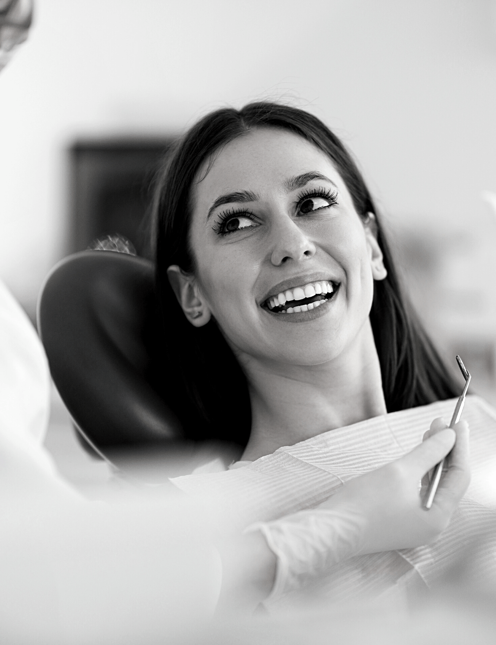 Woman looking relaxed at the dentist | Find the best dentist near me in Leawood 66209. dental crown and Bridges