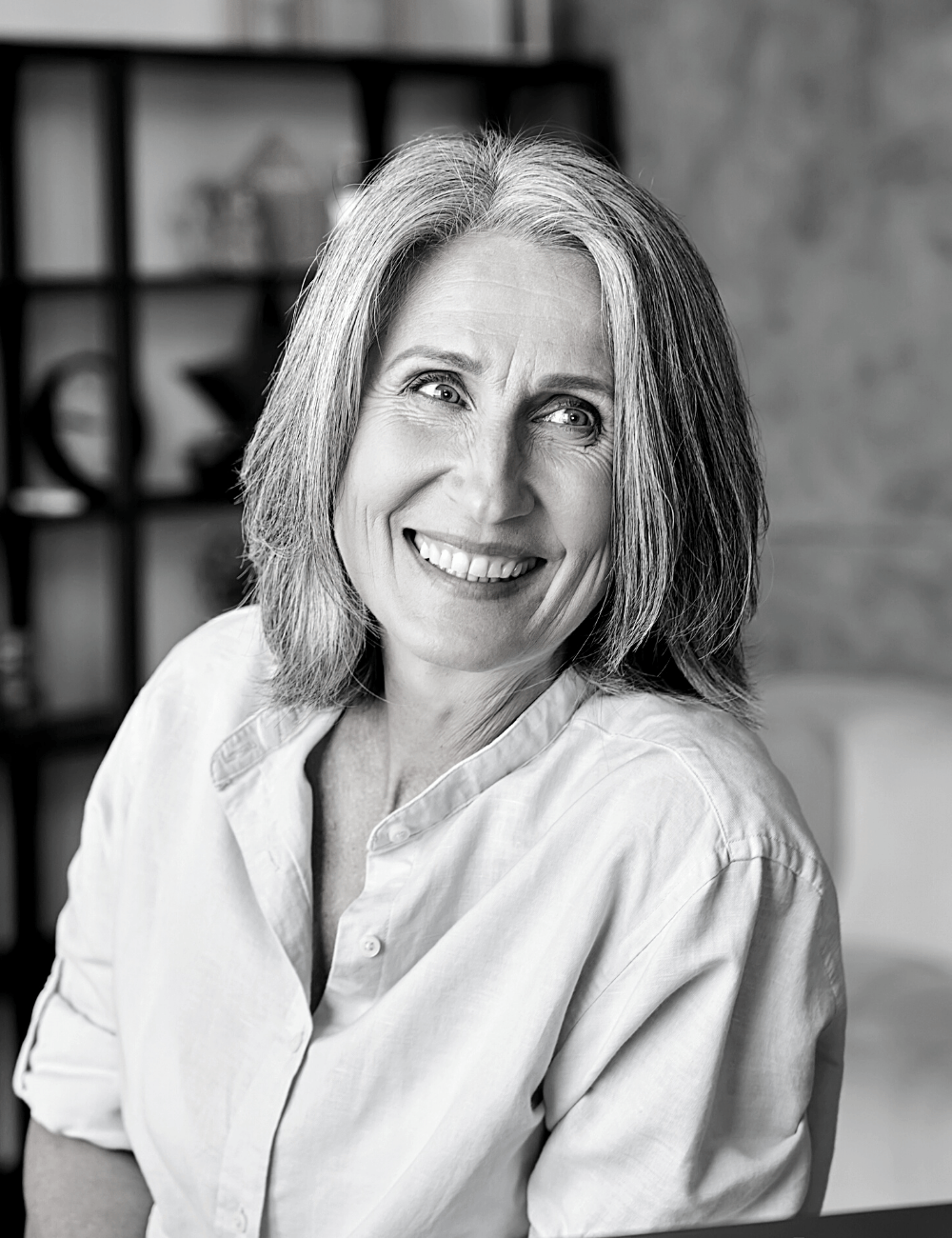 woman smiling with full teeth | Get custom dentures in Leawood 66209. restorative dentistry services