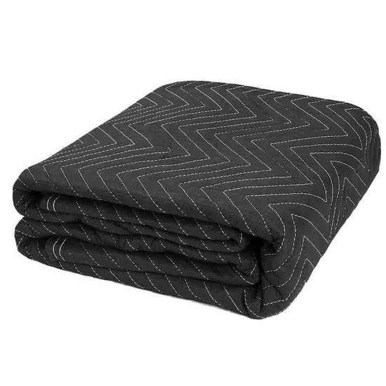 Folded dark gray blanket with a subtle zigzag pattern