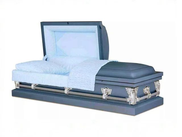Blue metal casket from Caring Cremations