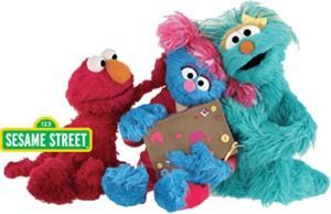 Sesame Street puppets Elmo, Rosita, and Cookie Monster sitting together on a white background