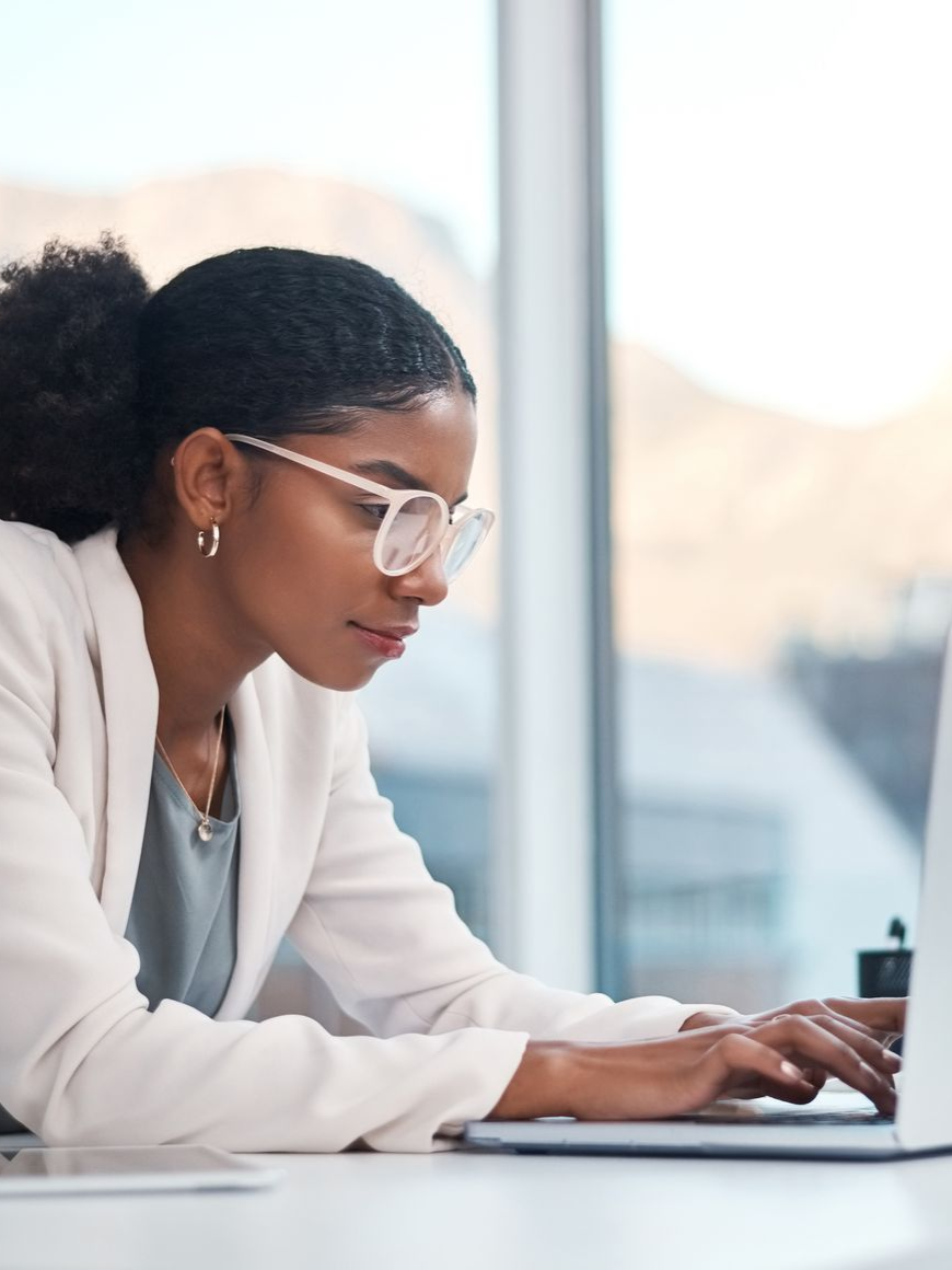 Professional property manager at a laptop