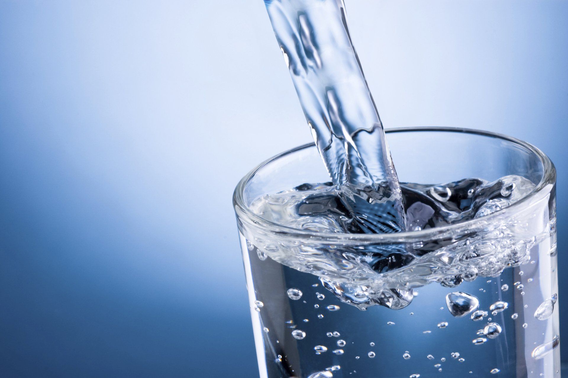 Pouring Water into Glass — Boca Raton, FL — The Waterman Company