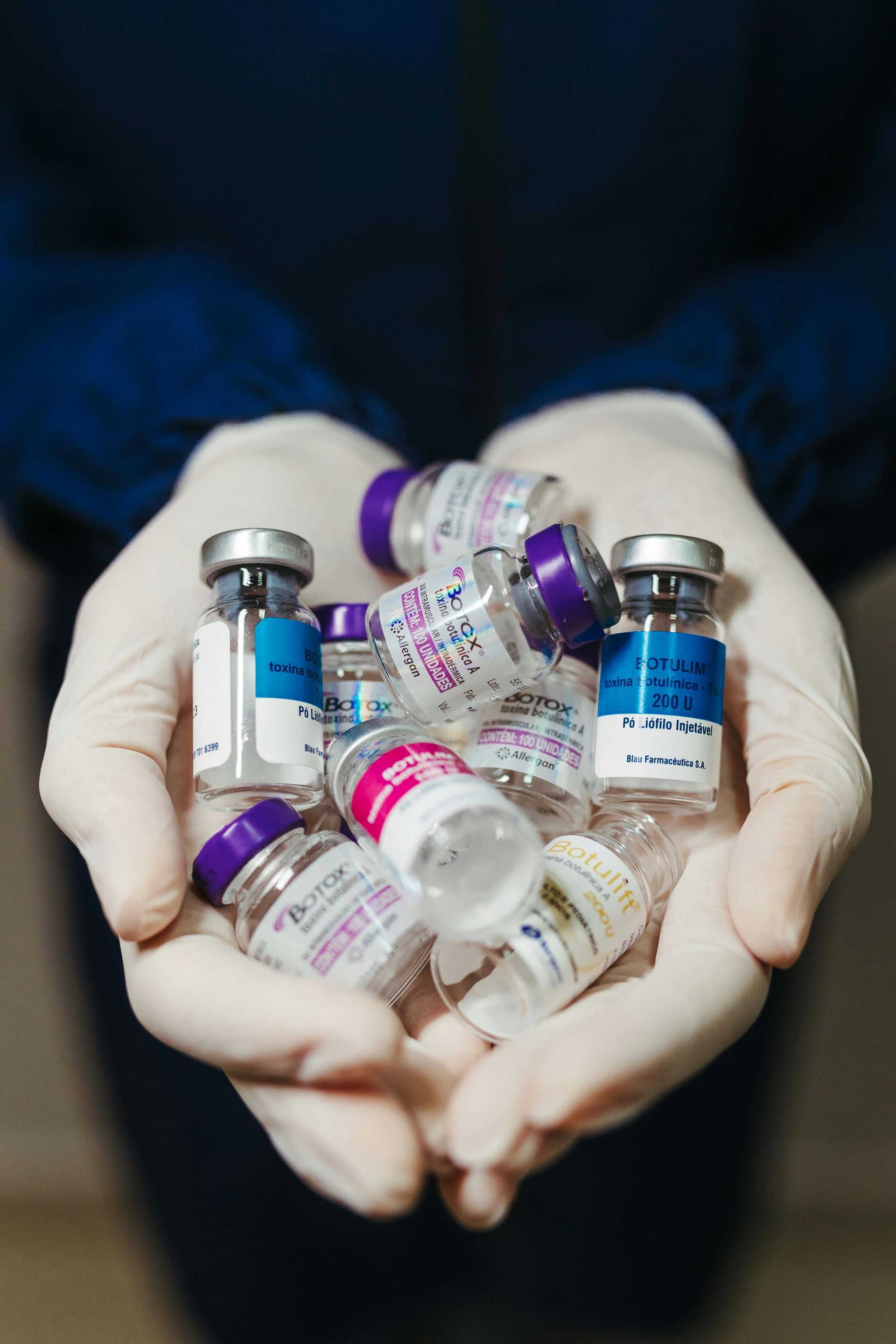 Doctor with handful of bottles of BOTOX®
