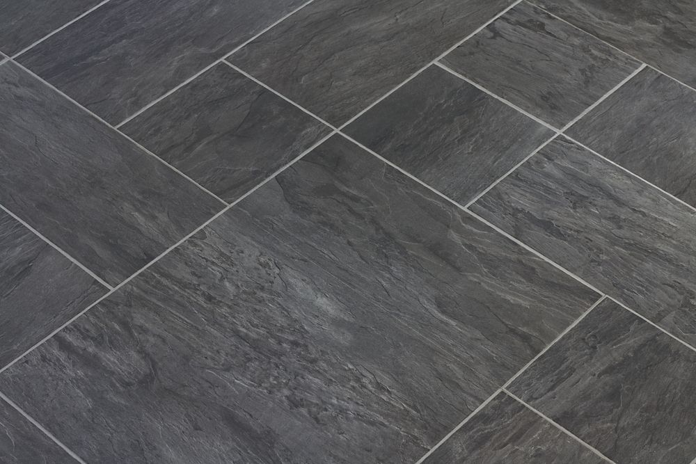Dark Grey Patterned Floor Tiles Laid Diagonally with Light Grout Lines — Midcoast Wall & Floor Tiling in Boambee East, NSW