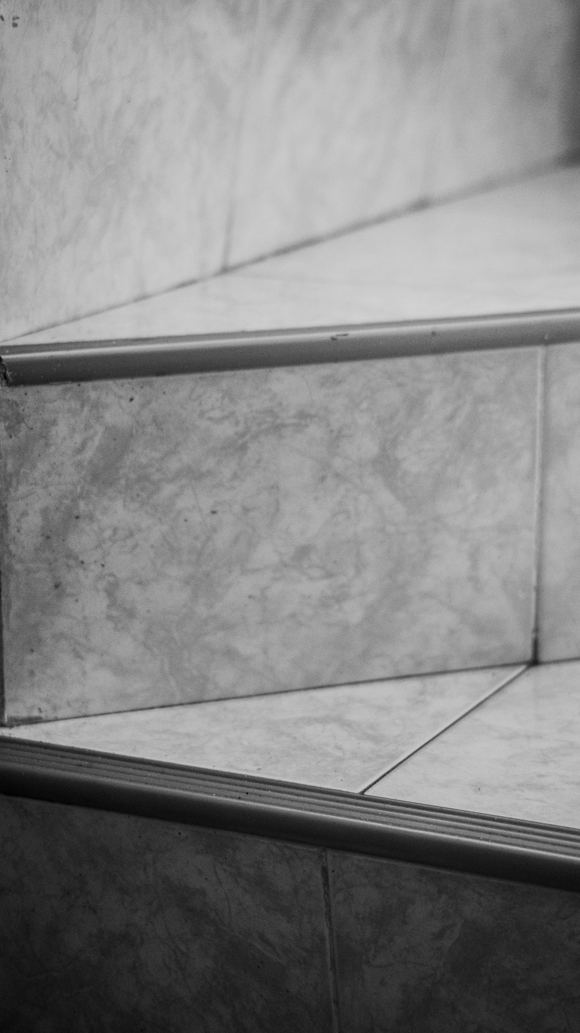 Black-And-White Close-Up of Concrete Steps — Midcoast Wall & Floor Tiling in Woolgoolga, NSW