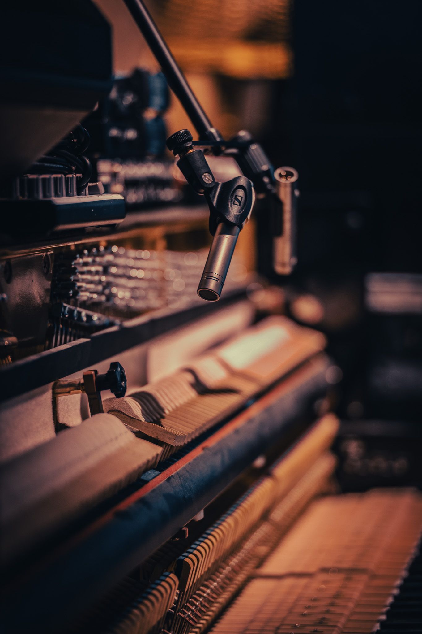 a close up of a piano with a microphone attached to it .