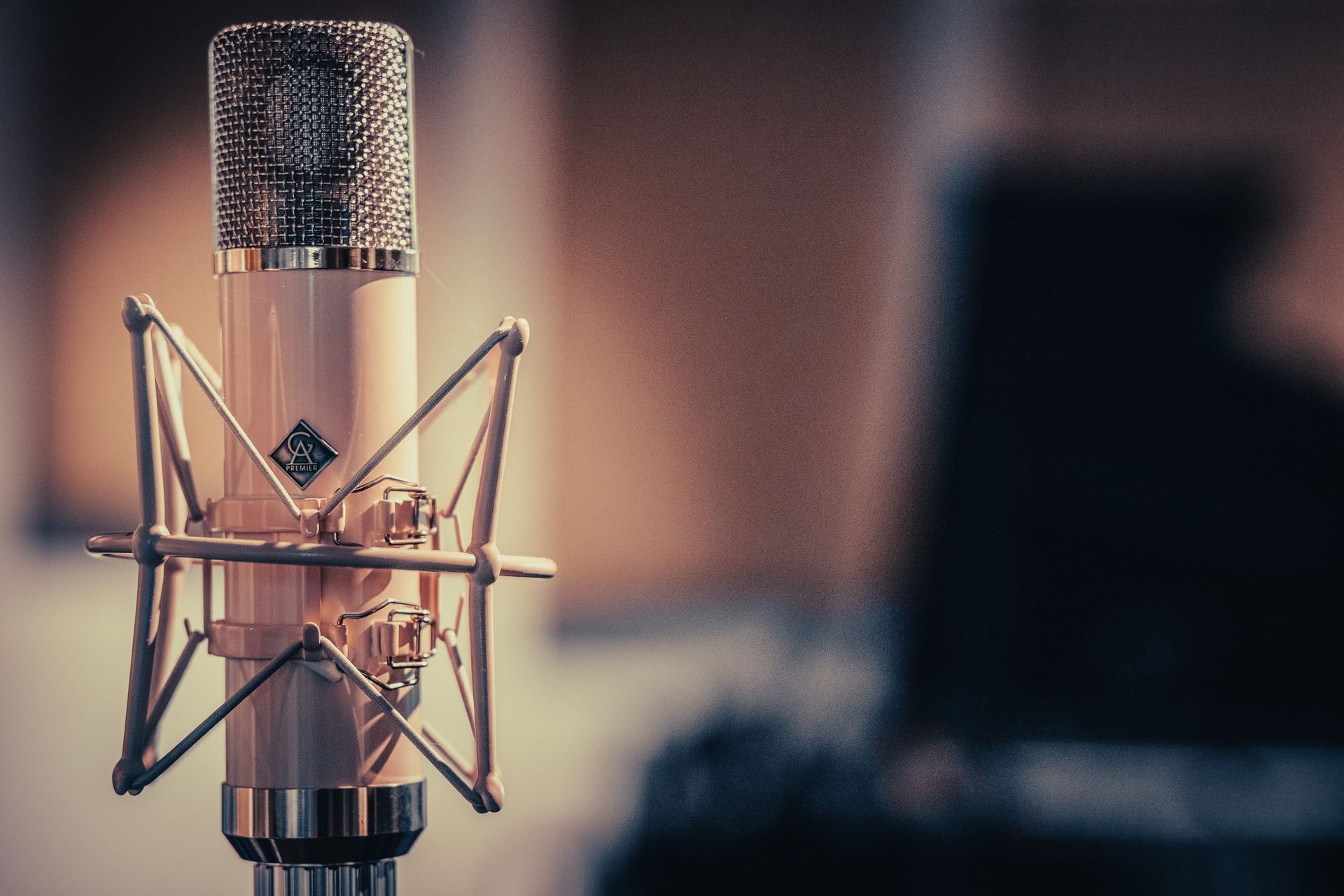 a close up of a microphone in a recording studio