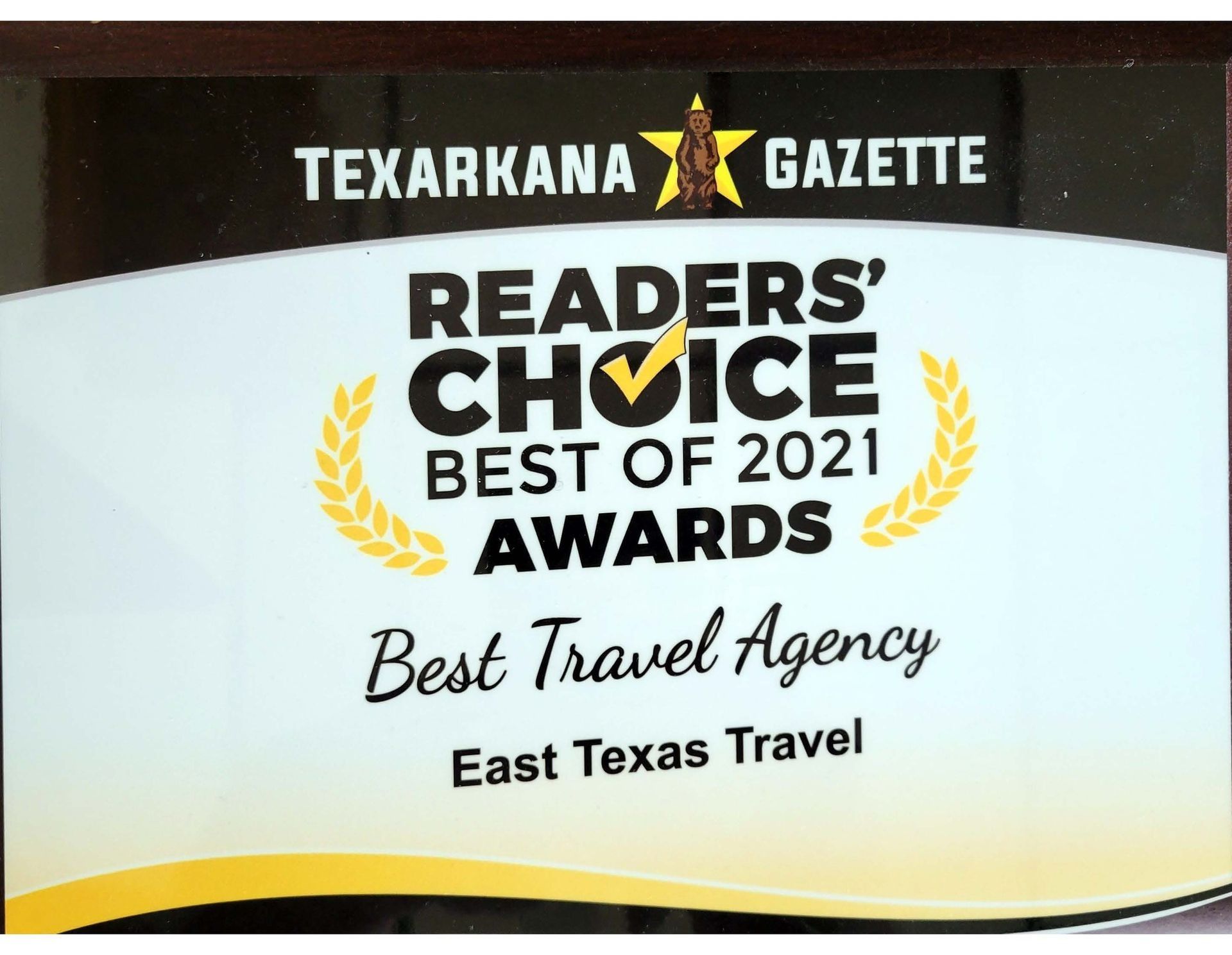 Award plaque: Texarkana Gazette Readers' Choice Best of 2021 for Best Travel Agency, awarded to East Texas Travel.