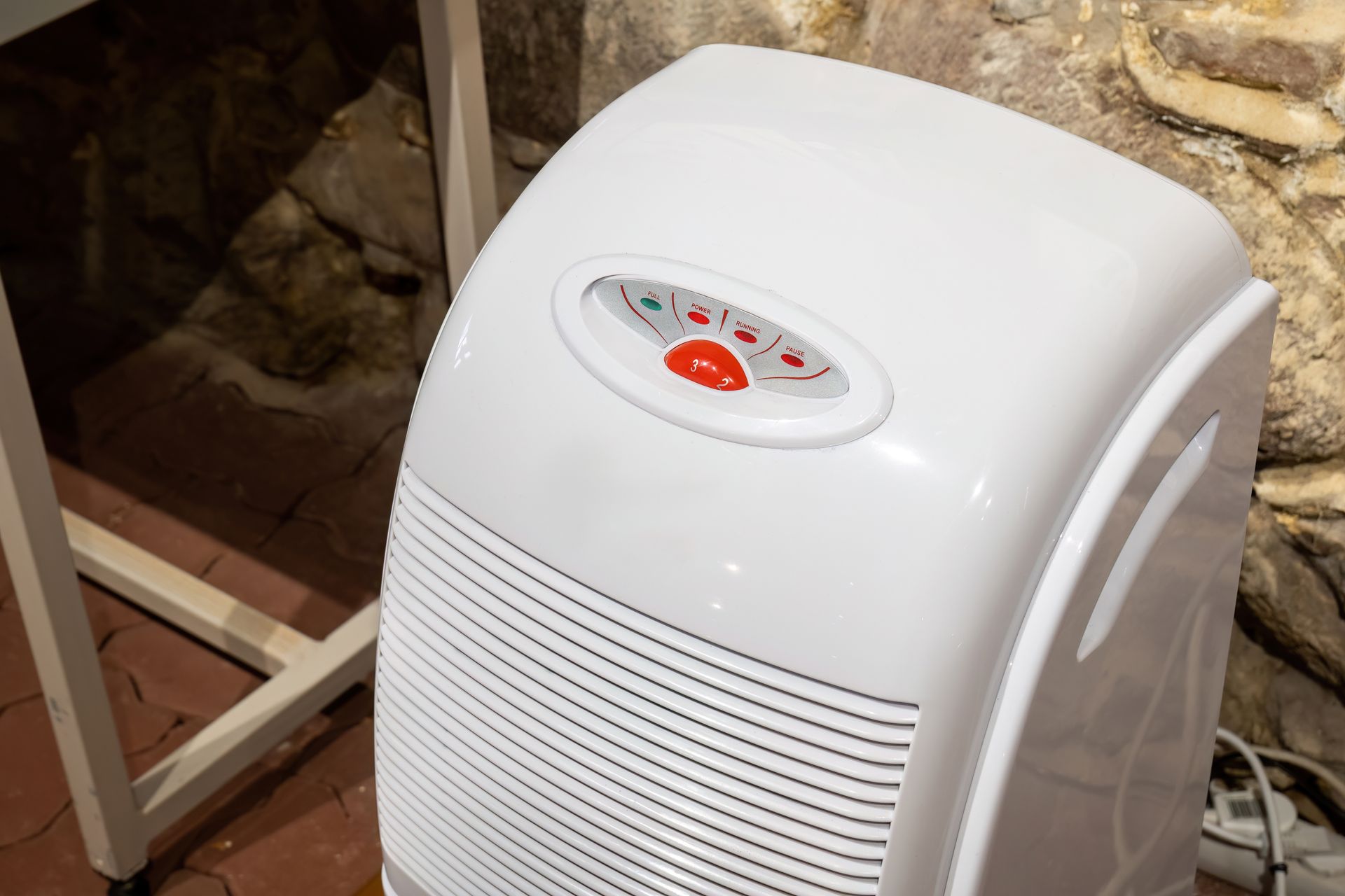 Crawlspace dehumidifier helping control moisture in an enclosed space.