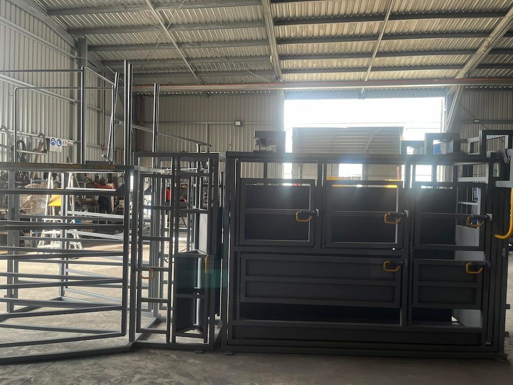 A Warehouse Filled With Lots Of Metal Fences And Gates — Quality Fabrications & Welding Pty Ltd In Bohle, QLD