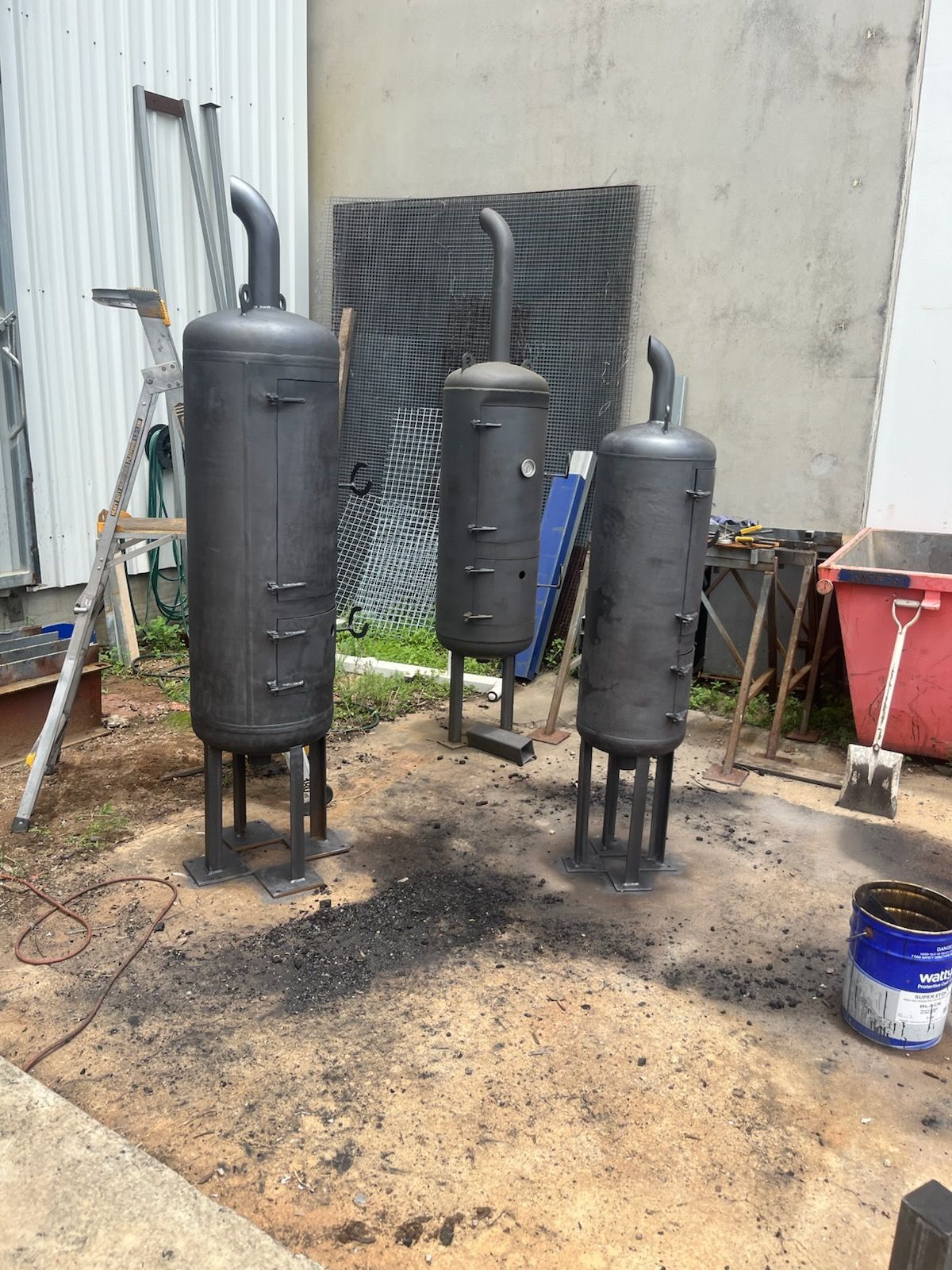 A Metal Frame Is Sitting On Top Of A Concrete Floor — Quality Fabrications & Welding Pty Ltd In Bohle, QLD