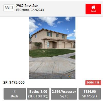 Real estate listing: 2962 Ross Ave, El Centro, CA. Two-story beige house with green trim, sold for $475,000.